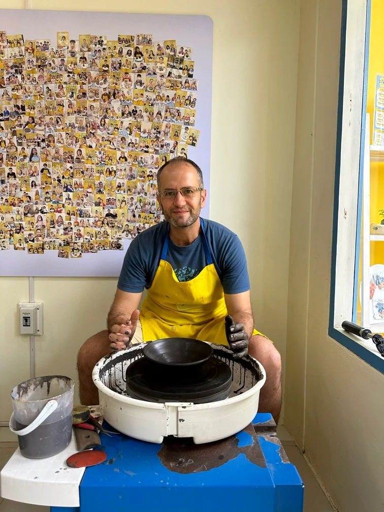 Alejandro working on a pottery wheel in Phuket